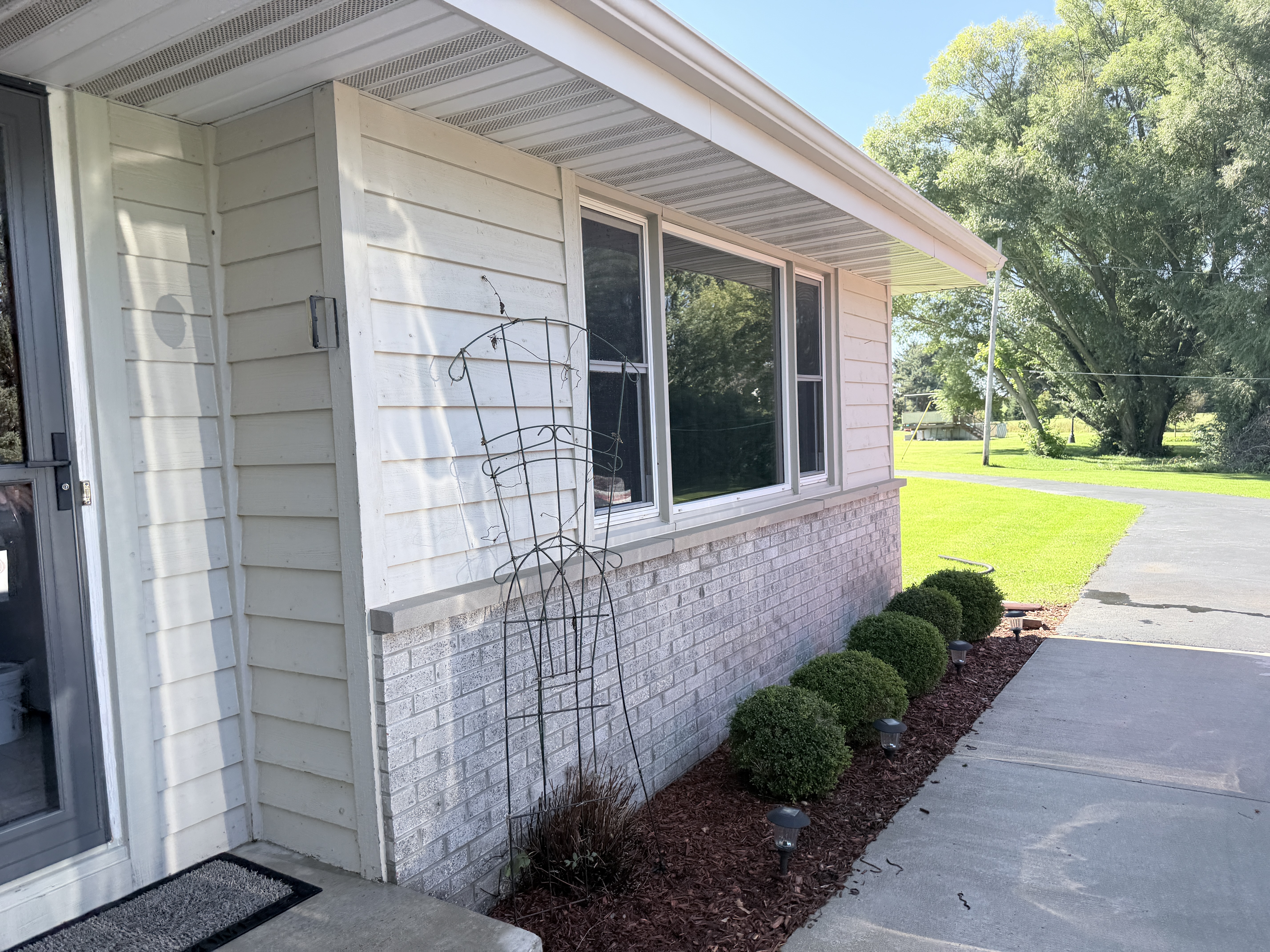 After house washing in Bristol, WI by Code 3 Cleaning — pair 5 of 13, project #1740