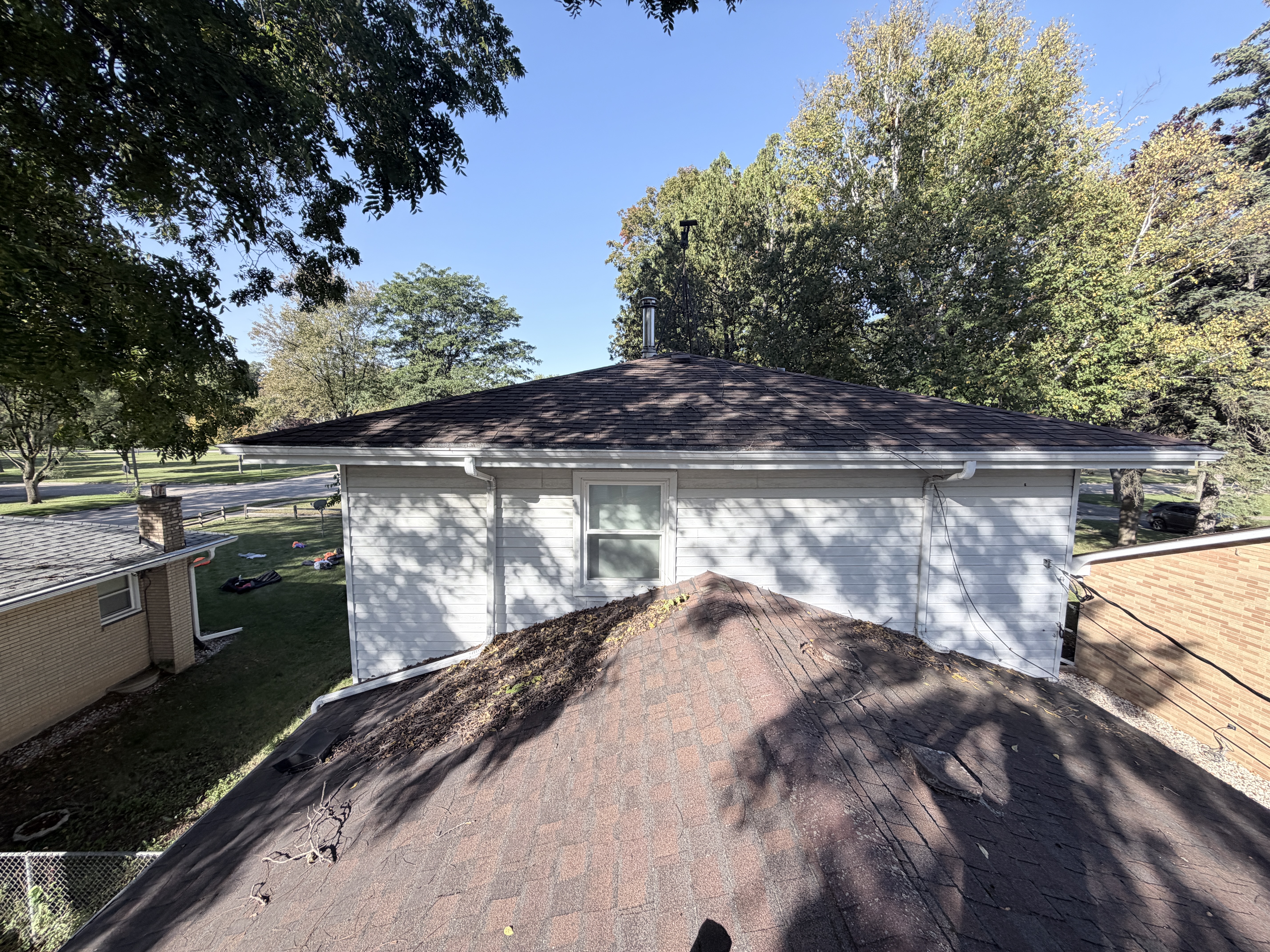 Before roof washing in Zion, IL by Code 3 Cleaning — pair 2 of 10, project #1842