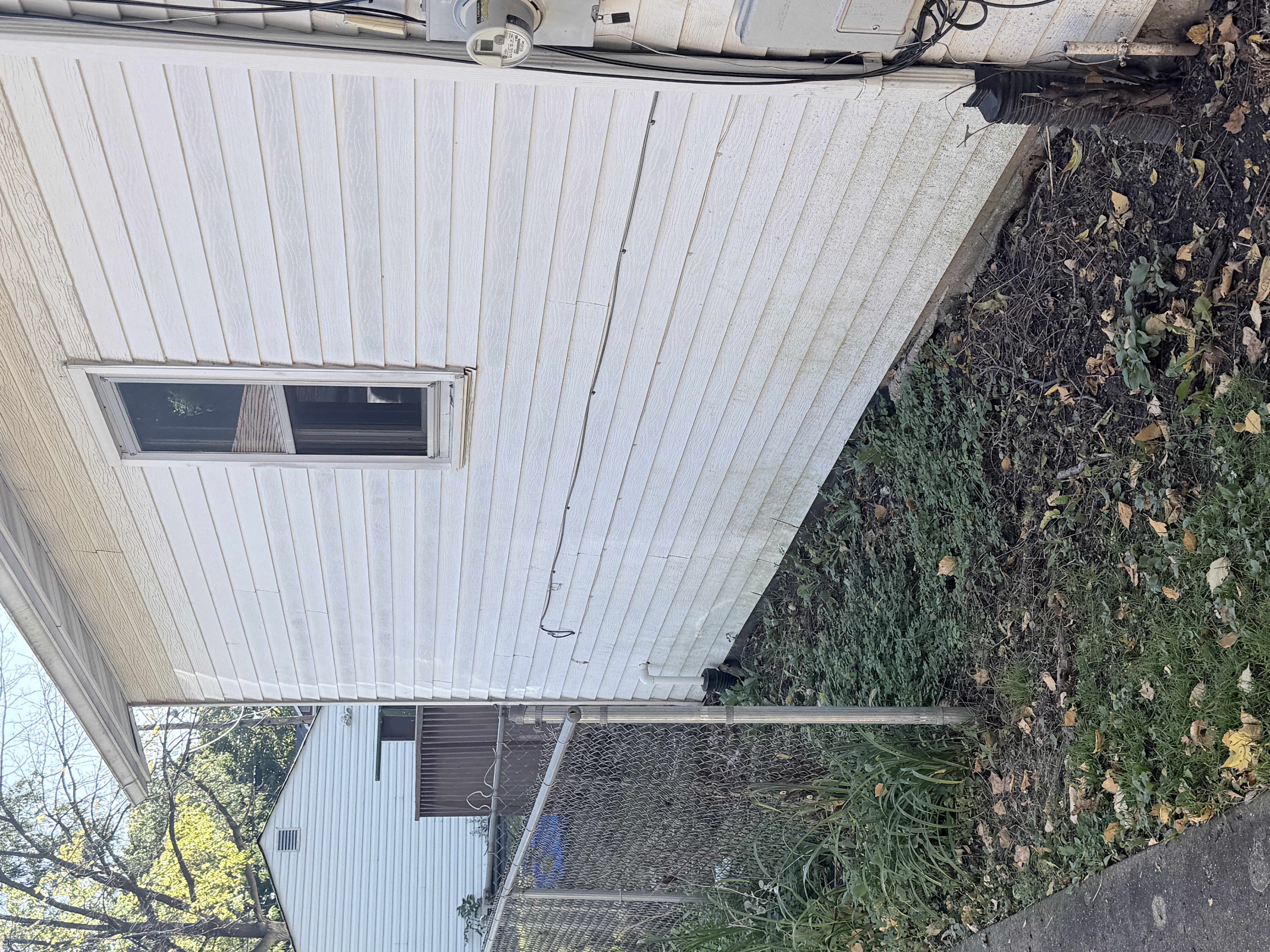 Before roof washing in Zion, IL by Code 3 Cleaning — pair 8 of 10, project #1842