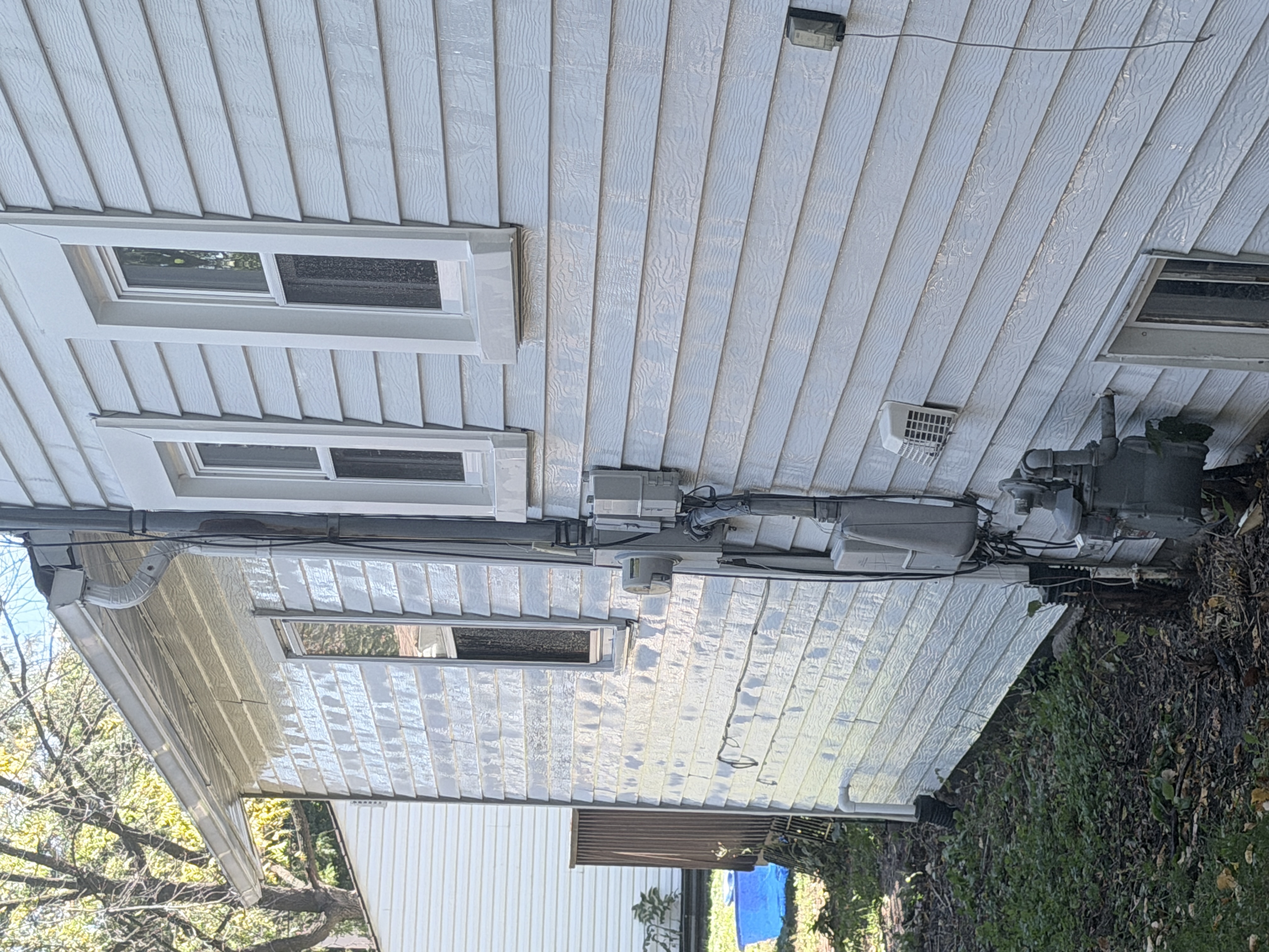 After roof washing in Zion, IL by Code 3 Cleaning — pair 9 of 10, project #1842