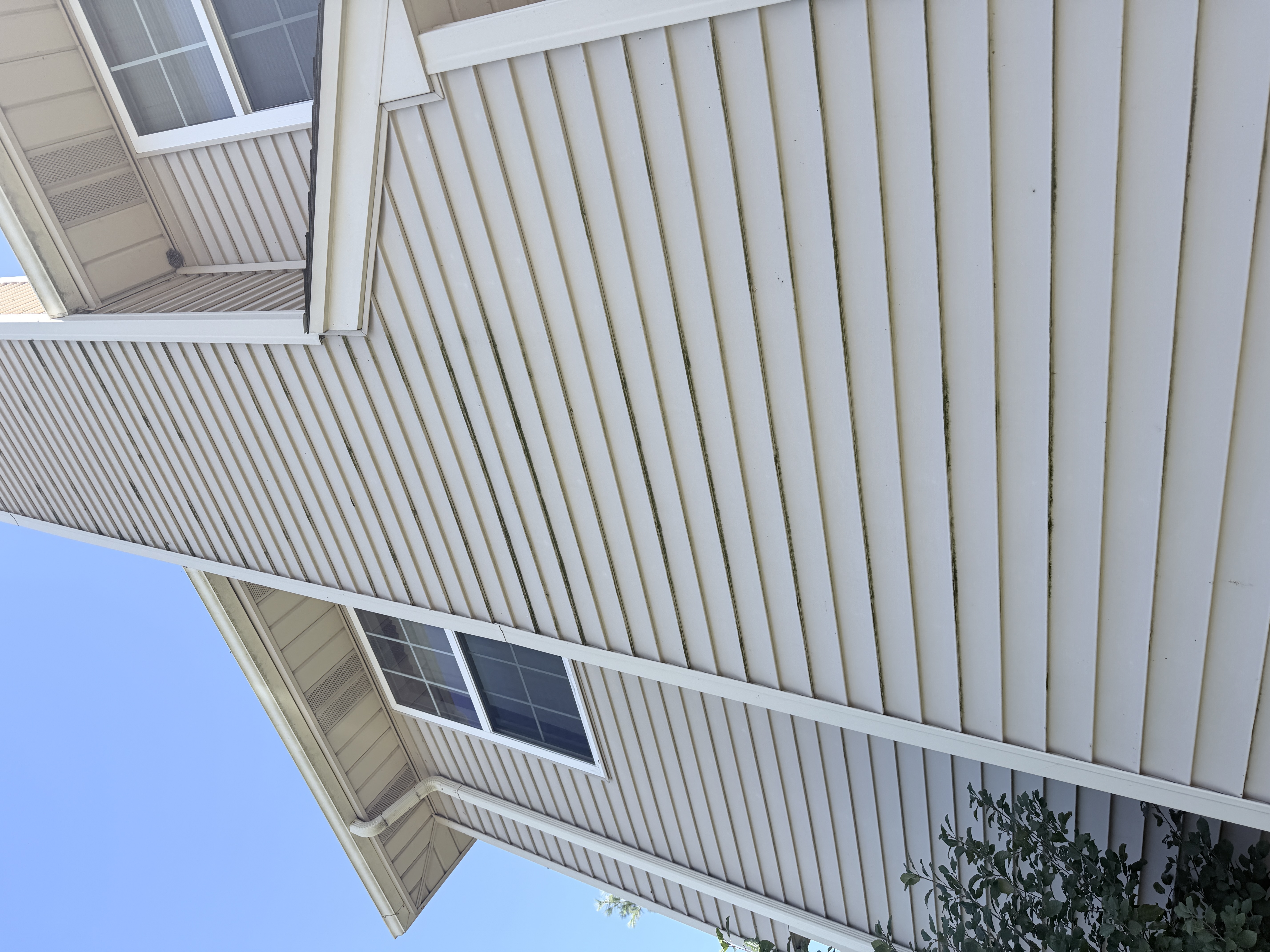Before house washing in Pleasant Prairie, WI by Code 3 Cleaning — pair 3 of 11, project #1865