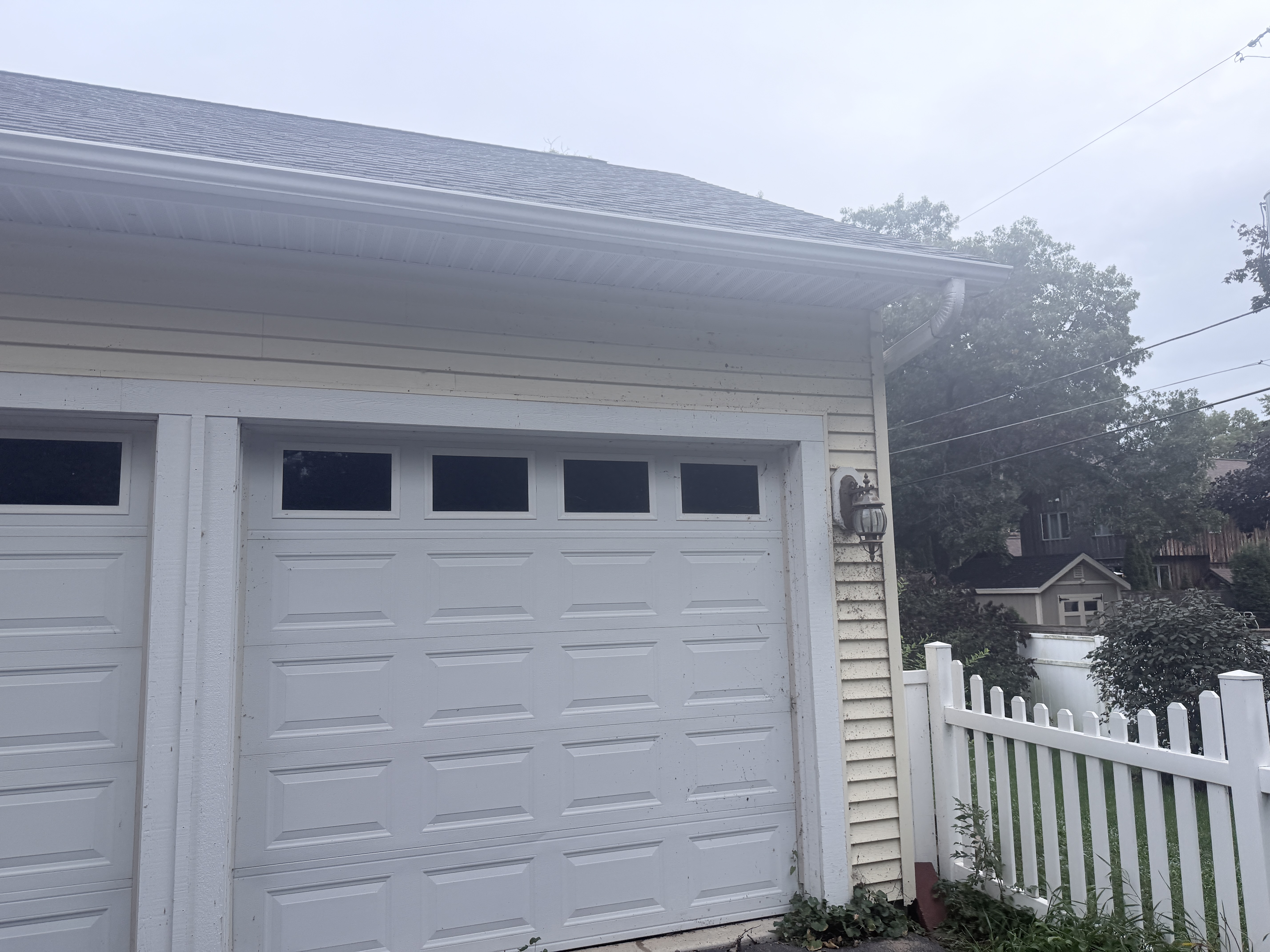 Before house washing and fence cleaning in Pleasant Prairie, WI by Code 3 Cleaning — pair 5 of 10, project #1936