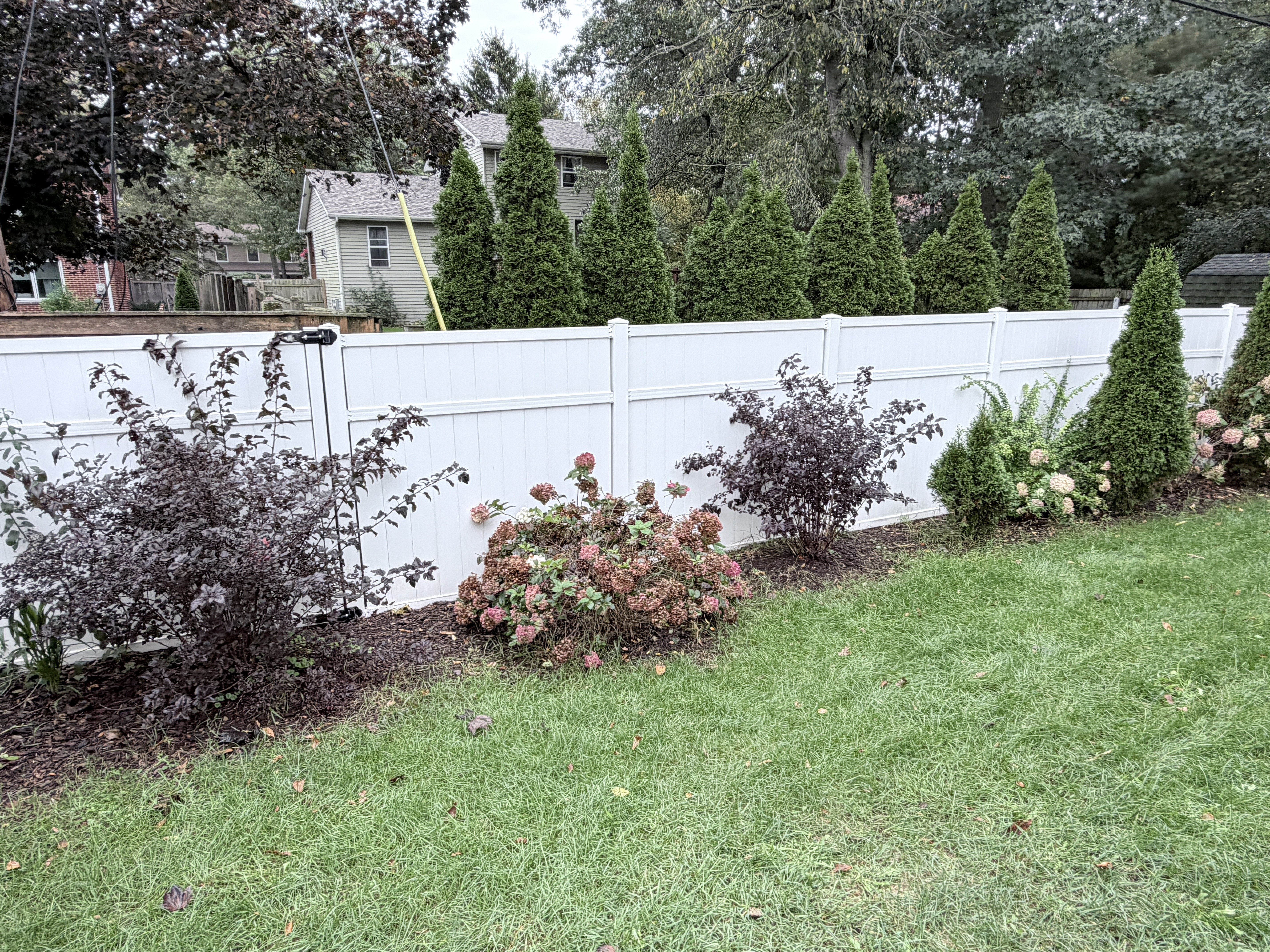 After house washing and fence cleaning in Pleasant Prairie, WI by Code 3 Cleaning — pair 9 of 10, project #1936